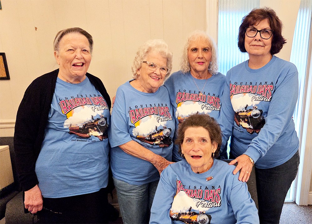 Five DeQuincy Federated Service League members wearing Louisiana Railroad Days Festival shirts